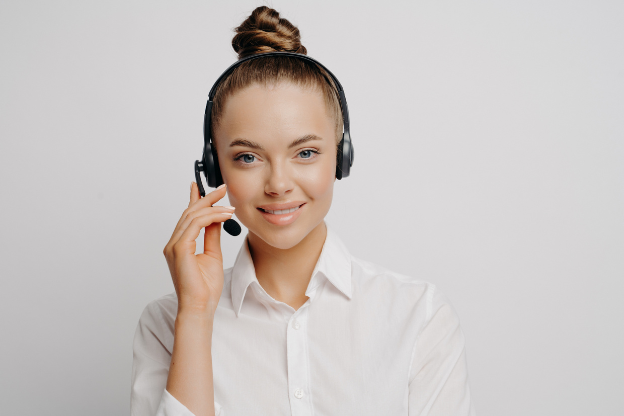 Female tech support worker with black headset